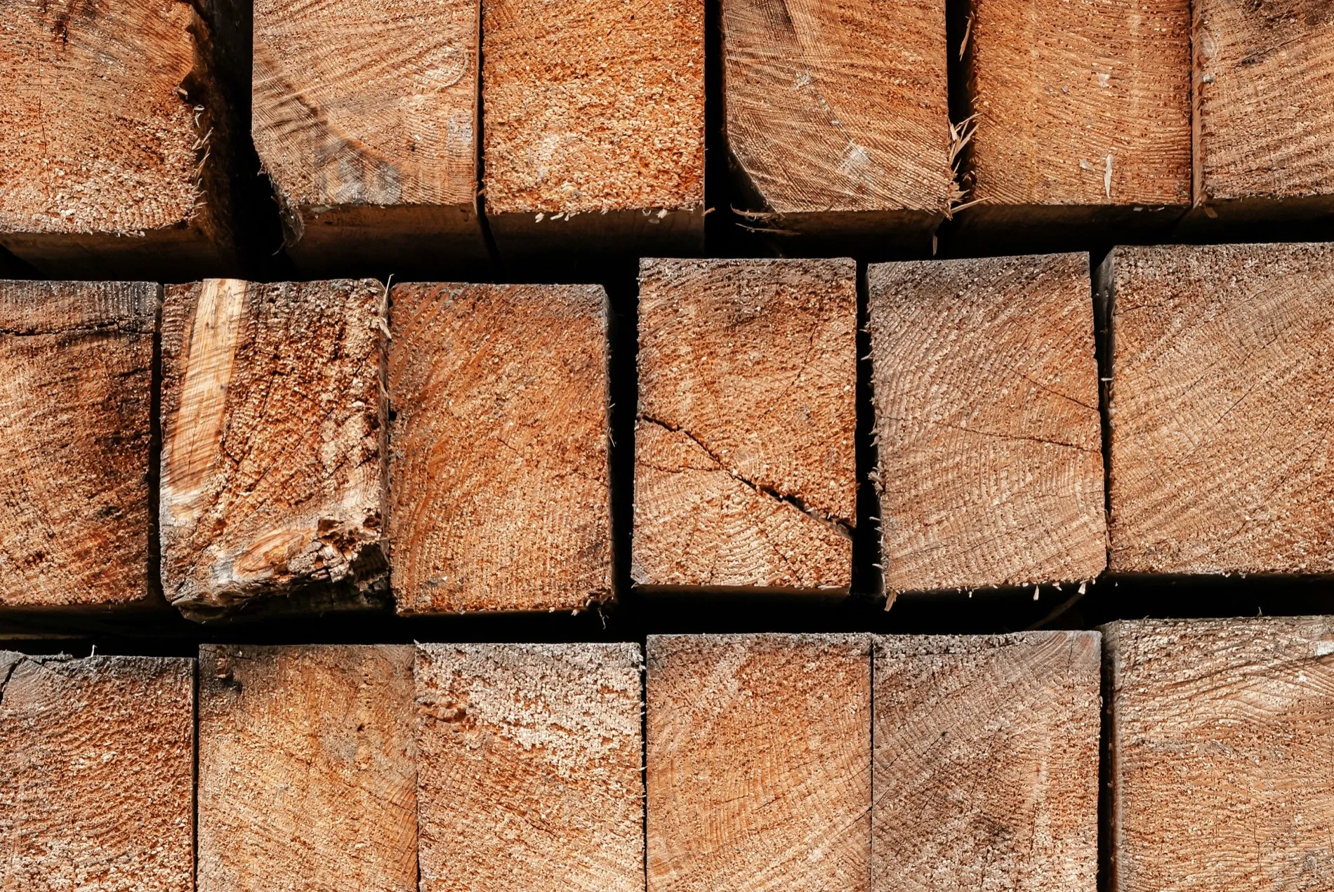 Squared beams stacked, the sawn end grain facing out