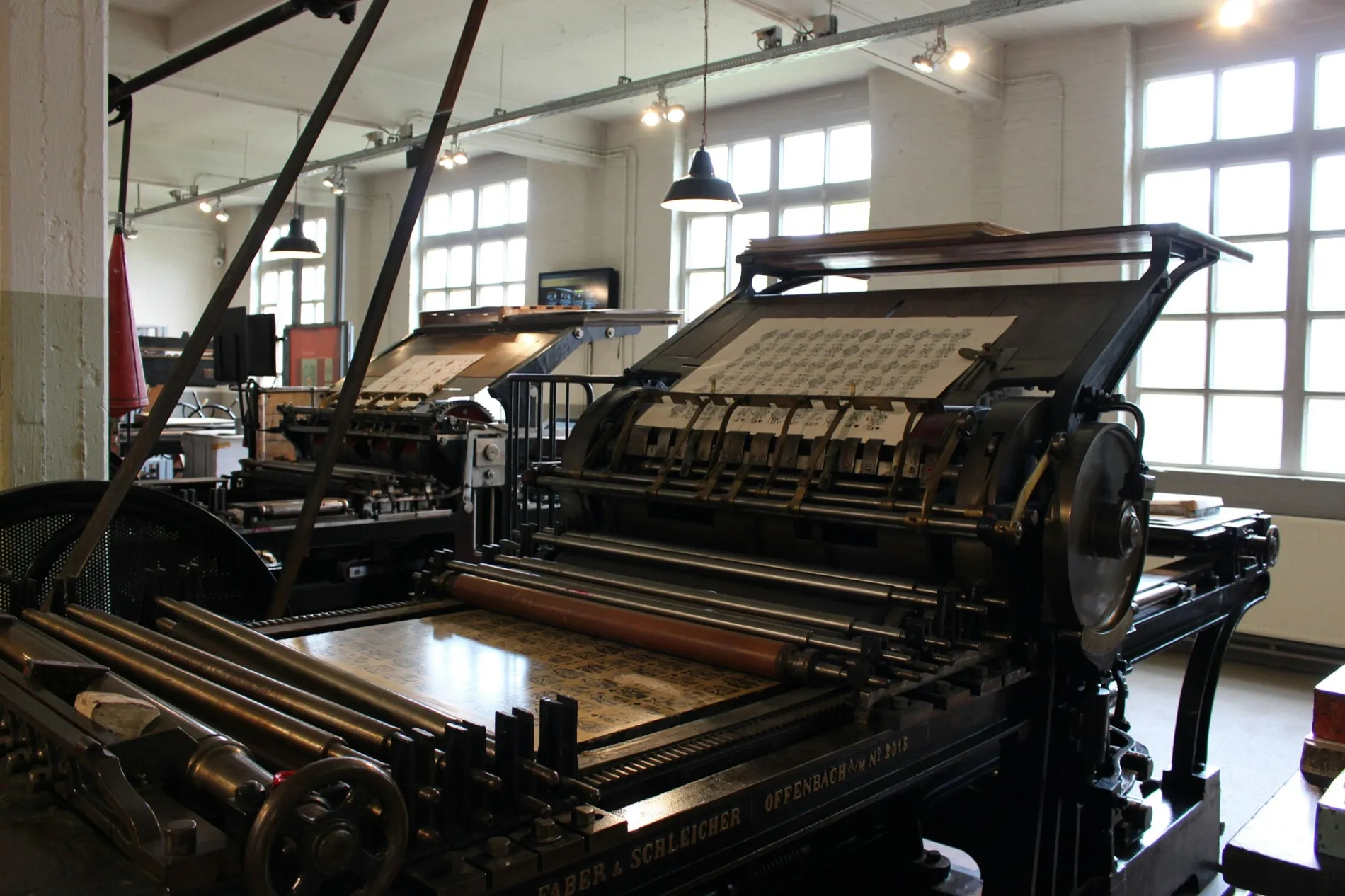 A press hall with the machine running the length of it